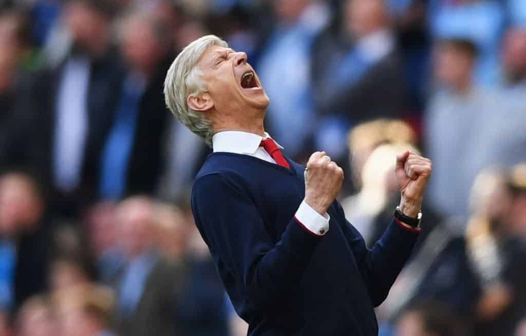 Arsene Wenger celebrates v Manchester City